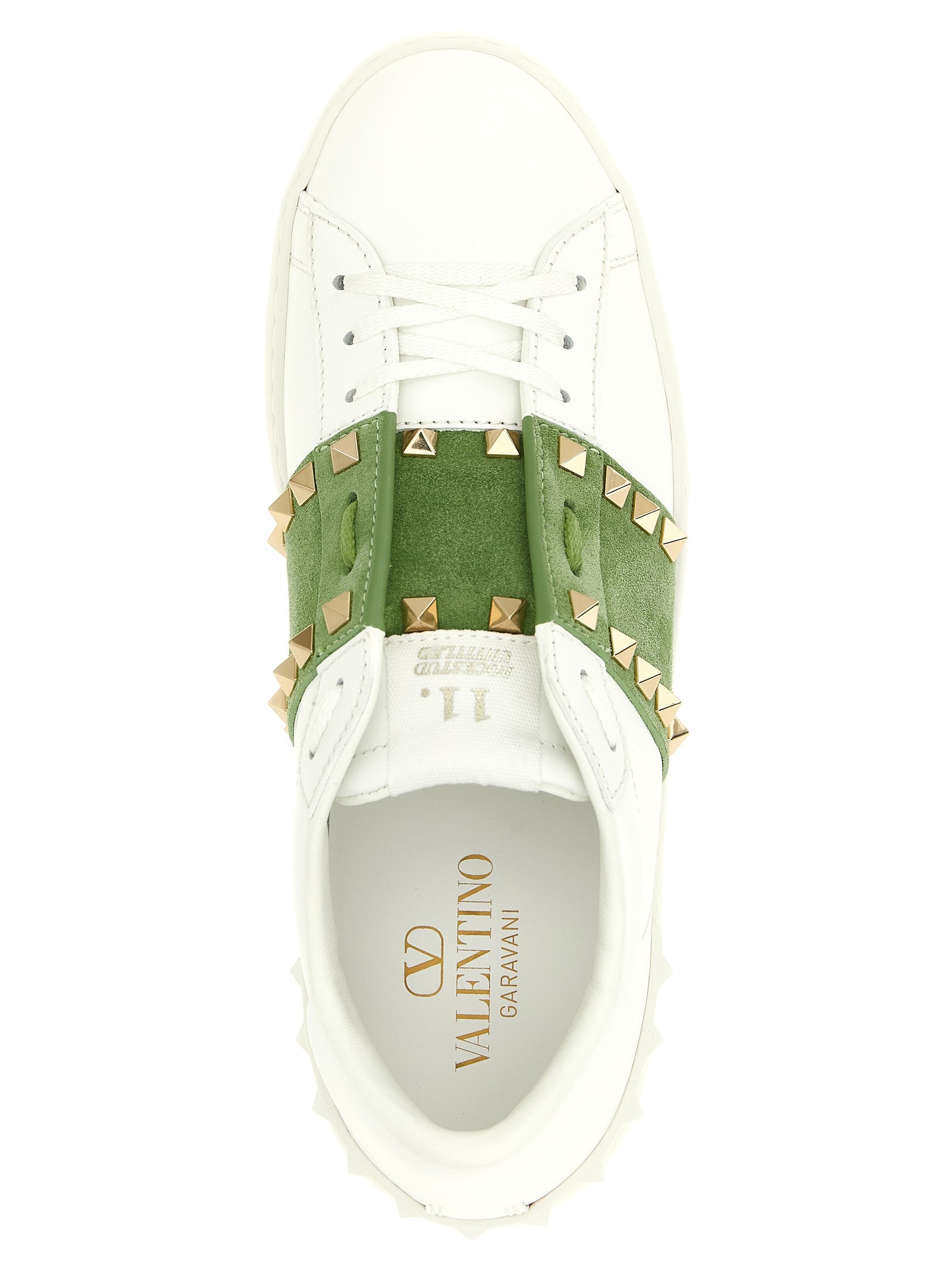 Sneakers by Valentino Garavani for women in calfskin leather bicolour, green, white & signature presents a impeccable silhouette as Rockstud Women's Low Top Calfskin Leather Sneakers, expertly defined by a impeccable low-top style for a impeccable, high-fashion look.