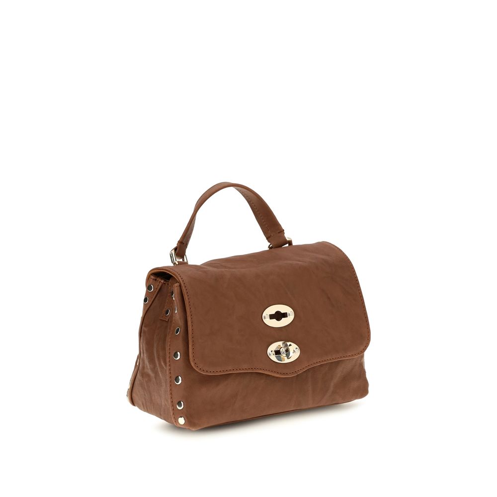 Shoulder Flap Bag by Zanellato for women in suede leather brown & signature features an effortlessly chic silhouette with a secure flap, zipper & clasp, ample built-in-compartments, and versatile shoulder-strap, handle & adjustable-strap for effortlessly chic everyday luxury.
