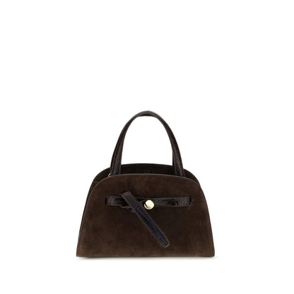 Shoulder Baguette Bag by Tory Burch for women in suede leather brown features a enviable silhouette, showcasing a secure zipper, ample , and enviable shoulder-strap & handle for a enviable finish.
