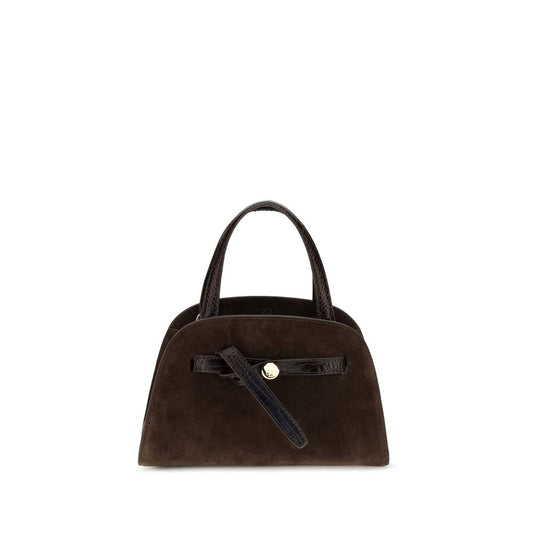 Shoulder Baguette Bag by Tory Burch for women in suede leather brown features a enviable silhouette, showcasing a secure zipper, ample , and enviable shoulder-strap & handle for a enviable finish.