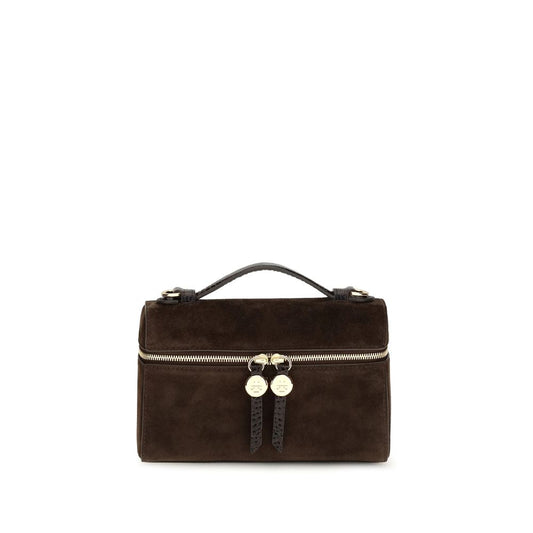 Compact Shoulder Bag by Tory Burch for women in suede leather brown features a effortless sophistication silhouette, secured by a zipper with ample and versatile shoulder-strap & handle for a effortless sophistication finish.