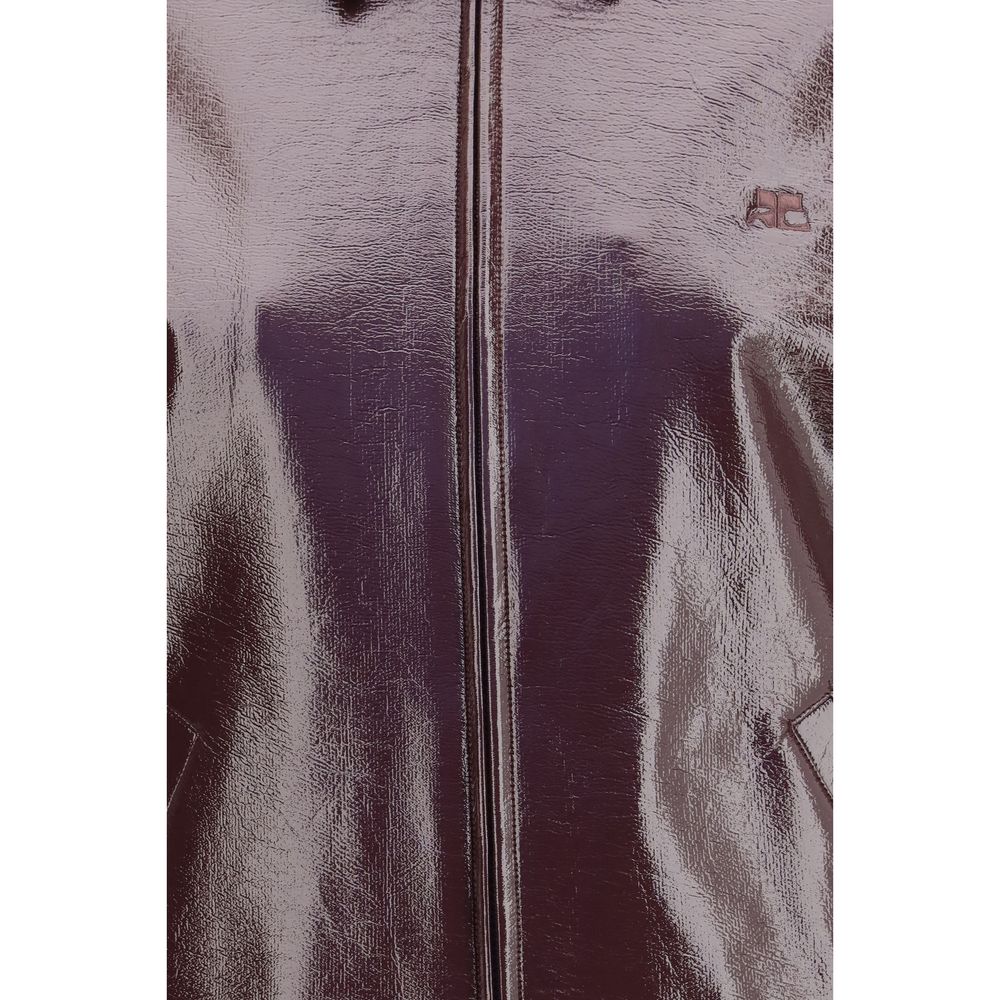 Bomber Jacket by Courrèges for women in acetate cotton & polyurethane bordeaux & signature showcases a bohemian silhouette, artfully detailed with a bohemian and signature pockets for a truly bohemian finish.