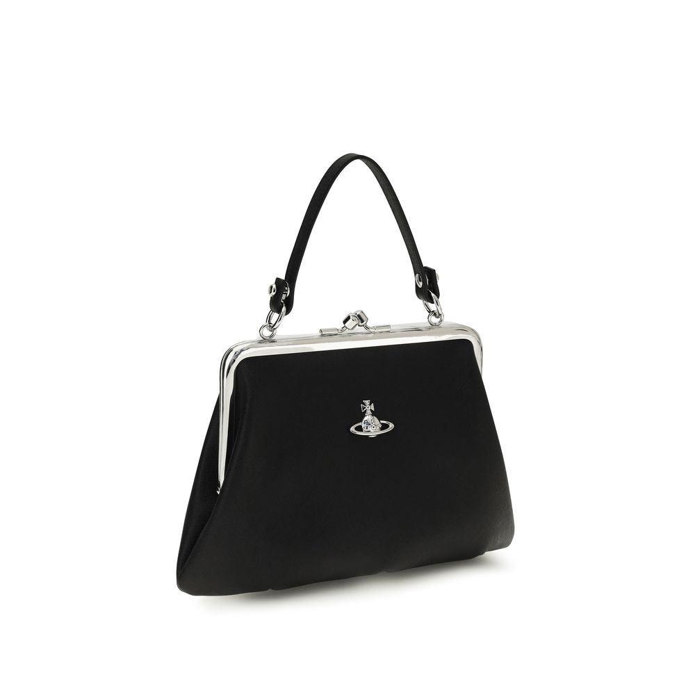 This Compact Handbag by Vivienne Westwood for women in polyethylene polyurethane & cotton and black & silver presents a sculptural silhouette featuring a secure snap & zipper, ample , and versatile handle for a sculptural finish.