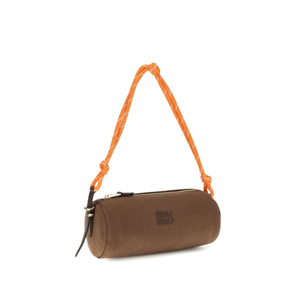 Wallet by Miu Miu for women in cotton brown showcases a discerning silhouette, artfully capturing the essence of Cotton Wallet with its functional .