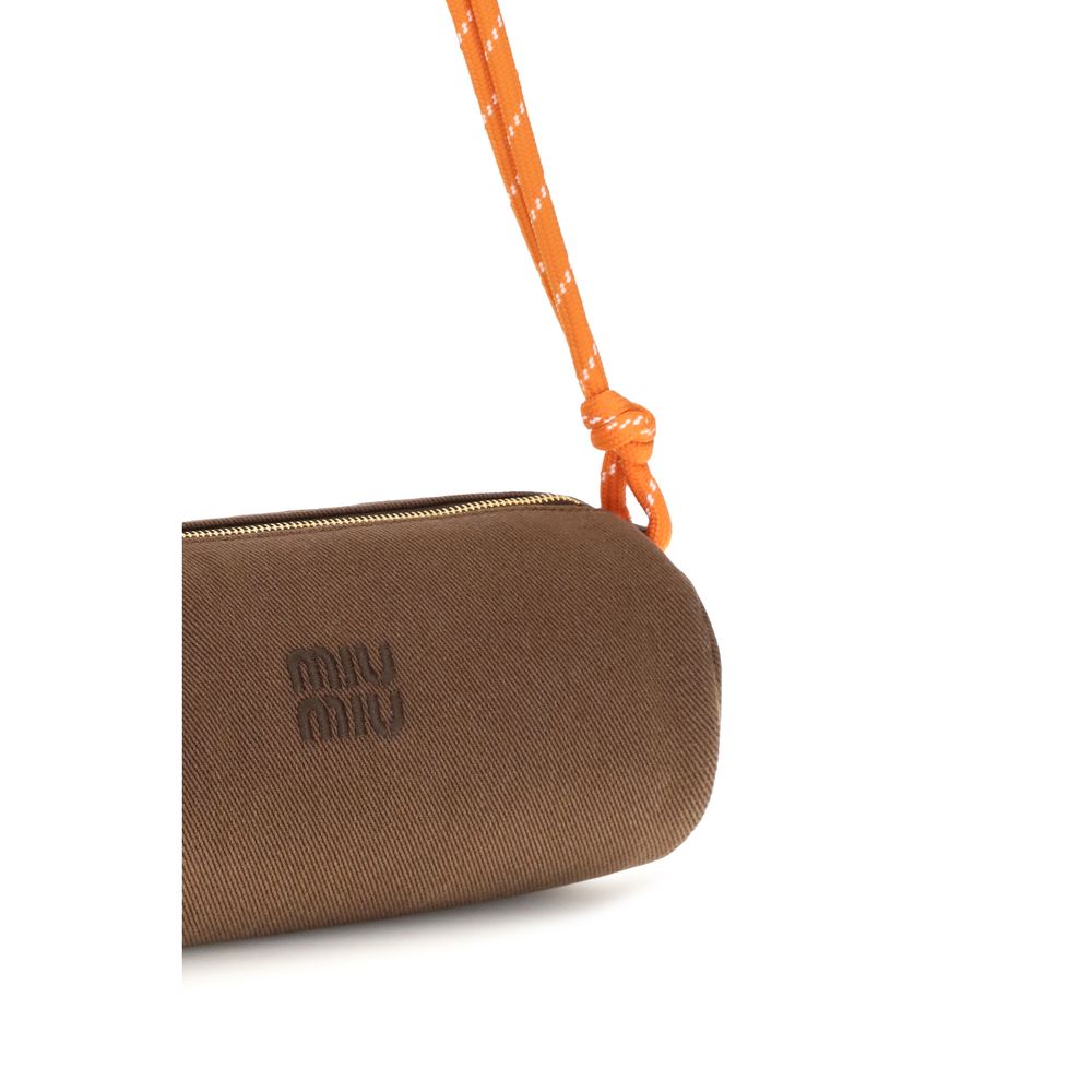 Wallet by Miu Miu for women in cotton brown presents a streamlined silhouette, showcasing the sophisticated design of the Cotton Wallet collection with functional .