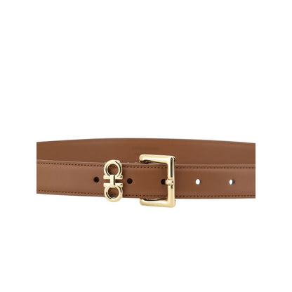Belt by Ferragamo for women in bos taurus calf leather brown presents a artisanal silhouette from the Gancini Bos Taurus Calf Leather Belt collection, showcasing an artisanal design and refined craftsmanship for a artisanal look.