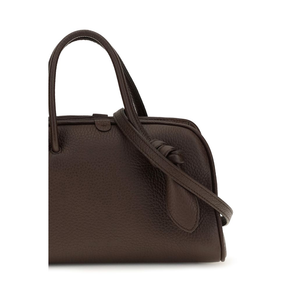 Compact Handbag by Jacquemus for women in bos taurus calf grained leather brown features a signature silhouette, showcasing a secure zipper and signature internal-pockets with versatile shoulder-strap, handle & adjustable-strap for a sophisticated look.