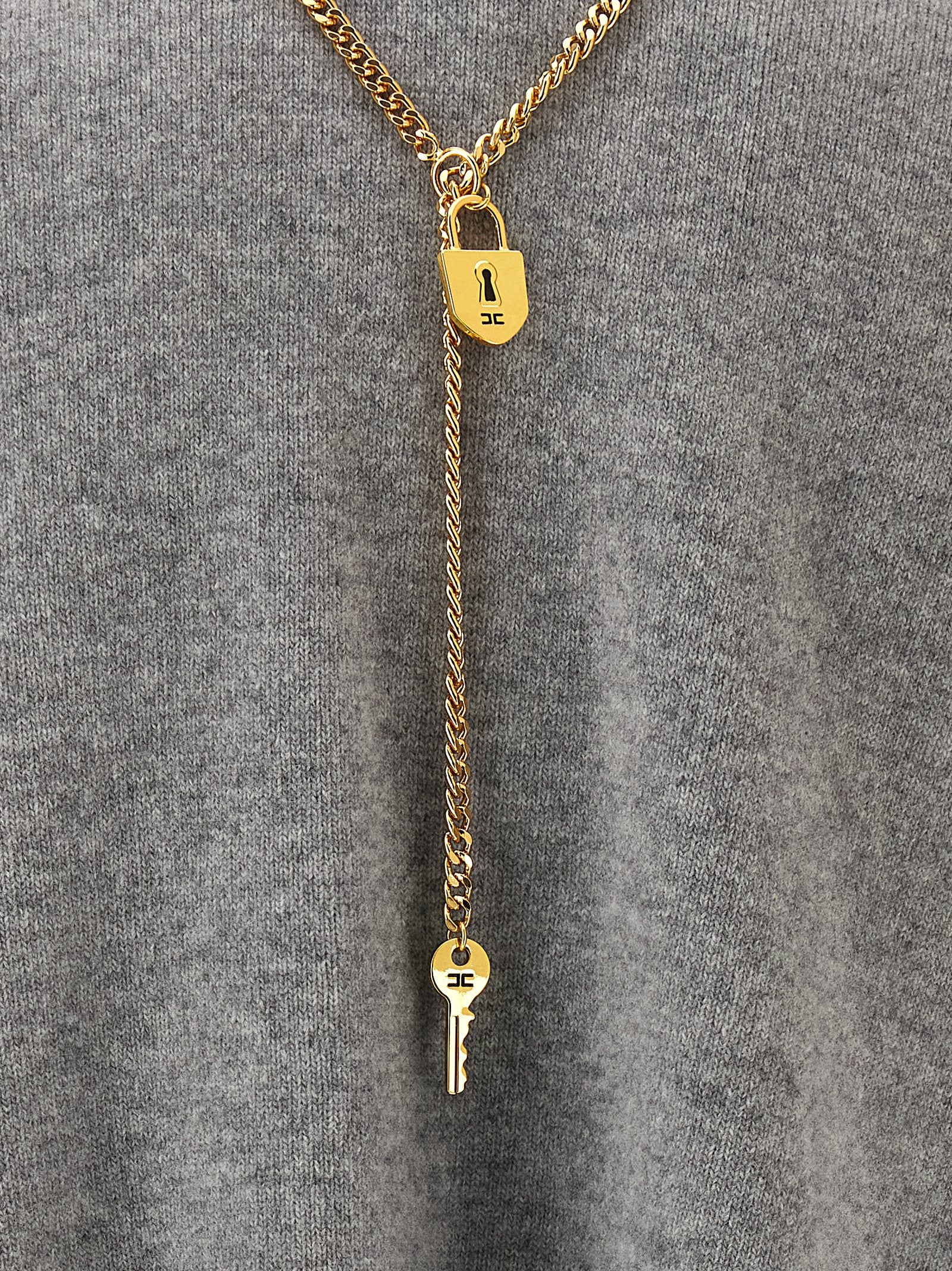 Dress by Elisabetta Franchi for women in polyamide & cashmere gray, gold, signature & monogram features an cute silhouette, detailed with a and that elegantly flows into a cute short.