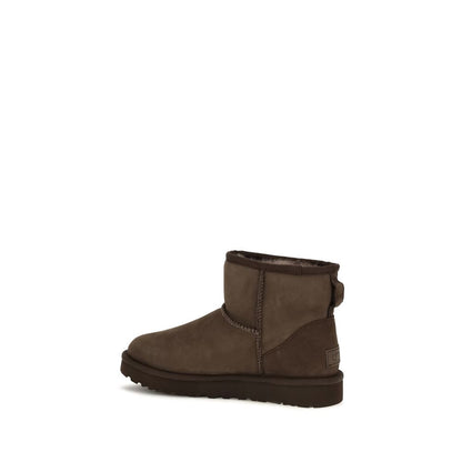Ankle Boots by UGG for women in bos taurus calf suede leather brown features an high-performance silhouette, showcasing the sophisticated design of the Women's Bos Taurus Calf Suede Leather Ankle Boots with a and a refined .