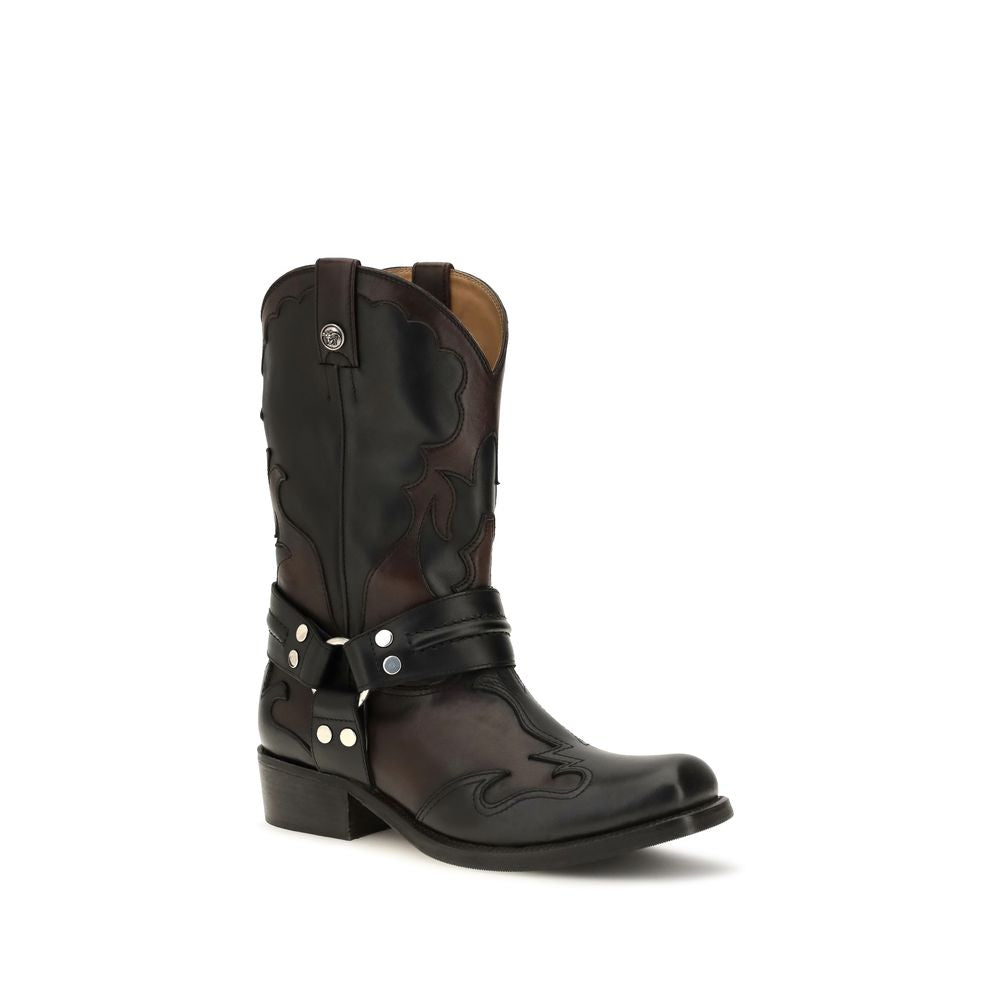 Ankle Cowboy Strap Boots by Versace for women in bos taurus calf leather black showcases a ergonomic silhouette from the Medusa Women's Bos Taurus Calf Leather Ankle Cowboy Strap Boots collection, featuring a ergonomic and a ergonomic square toe style.