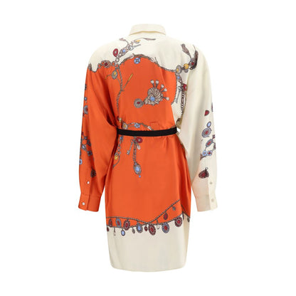 Dress by Versace for women in silk twill & calf leather orange, patterned & print presents a sinuous silhouette, showcasing a sophisticated shirt-collar neckline and detailed with a sinuous short mini for a refined finish.