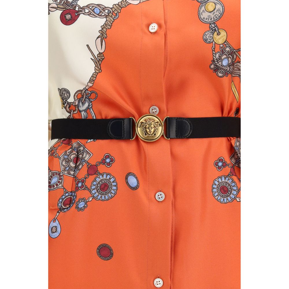 Dress by Versace for women in silk twill & calf leather orange, patterned & print features an eye catching silhouette with a sophisticated , elegant , and a refined short mini for a eye catching aesthetic.