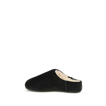 Mules Slippers Flat Shoes by UGG for women in suede leather & rubber black & signature presents a effortless chic silhouette, showcasing the Women's Suede Leather & Rubber Mules Slippers Flat Shoes design with a effortless chic and for a sophisticated look.