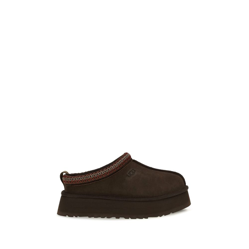 Mules Flat Shoes by UGG for women in eva polyester suede leather brown, natural & signature features an statuesque silhouette from the Women's EVA Polyester Suede Leather Mules Flat Shoes collection, showcasing a and a statuesque for a statuesque look.