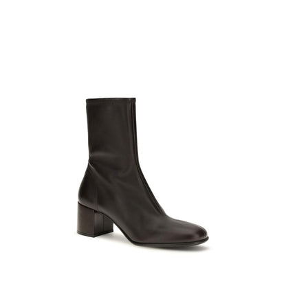 Ankle Boots by Prada for women in nappa leather & rubber brown & signature features an effortless chic silhouette from the Women's Nappa Leather & Rubber Ankle Boots collection, showcasing a effortless chic and refined for an effortless chic look.