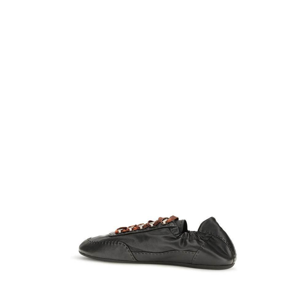 Athletic Sneakers by Prada for men in nappa leather & rubber black & patterned presents a sleek silhouette, perfectly capturing the athletic style essence of Men's Athletic Nappa Leather & Rubber Sneakers with its sleek design and premium finish.
