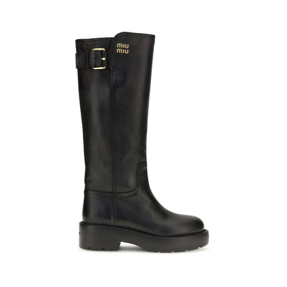 Platform High Knee-High Boots by Miu Miu for women in bos taurus calf leather black features an high-performance silhouette, showcasing the sophisticated design of the Women's Bos Taurus Calf Leather Platform High Knee-High Boots with a platform and a refined round toe style.