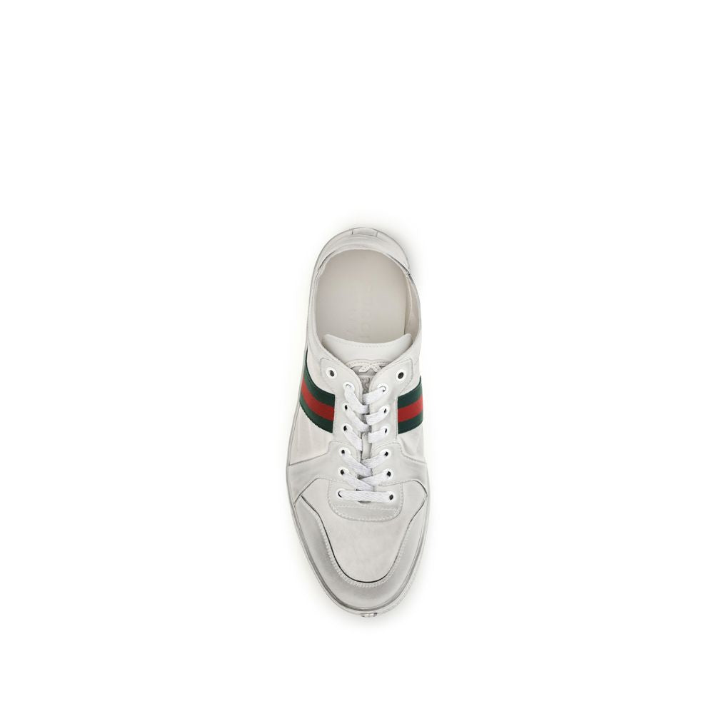 Sneakers by Gucci for men in bos taurus calf leather white presents a impeccable silhouette as Gg Men's Low Top Bos Taurus Calf Leather Sneakers, expertly defined by a impeccable low-top style for a impeccable, high-fashion look.