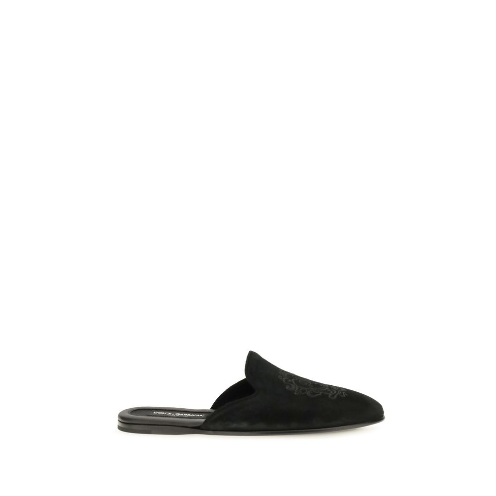This Flat Mule Mules Slip-On Shoes by Dolce & Gabbana for men in bos taurus calfskin leather & tu black features an exquisite silhouette from the Men's Bos Taurus Calfskin Leather & TU Flat Mule Mules Slip-On Shoes collection, defined by a sophisticated flat and elegant .