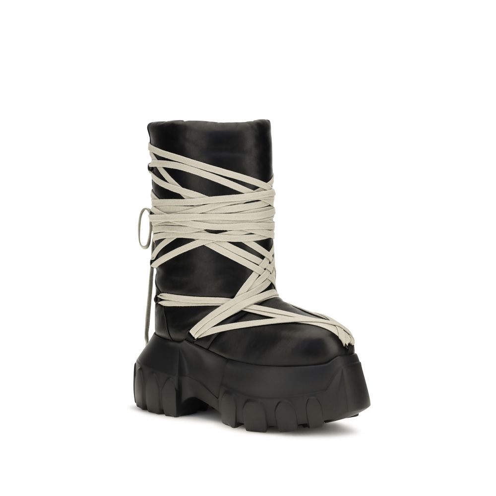 Platform Lace-Up High Knee-High Boots by Rick Owens for women in bos taurus calf leather black features an avant-garde Women's Bos Taurus Calf Leather Platform Lace-Up High Knee-High Boots silhouette, defined by a sophisticated platform and a avant-garde .