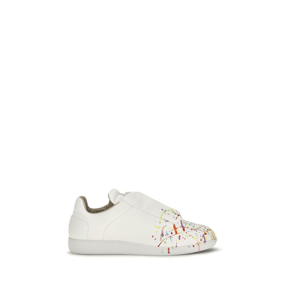 Sneakers by Maison Margiela for men in bos taurus calf patent leather white features a chic design, perfectly showcasing the chic low-top slip-on style of this Men's Low Top Slip On Bos Taurus Calf Patent Leather Sneakers.