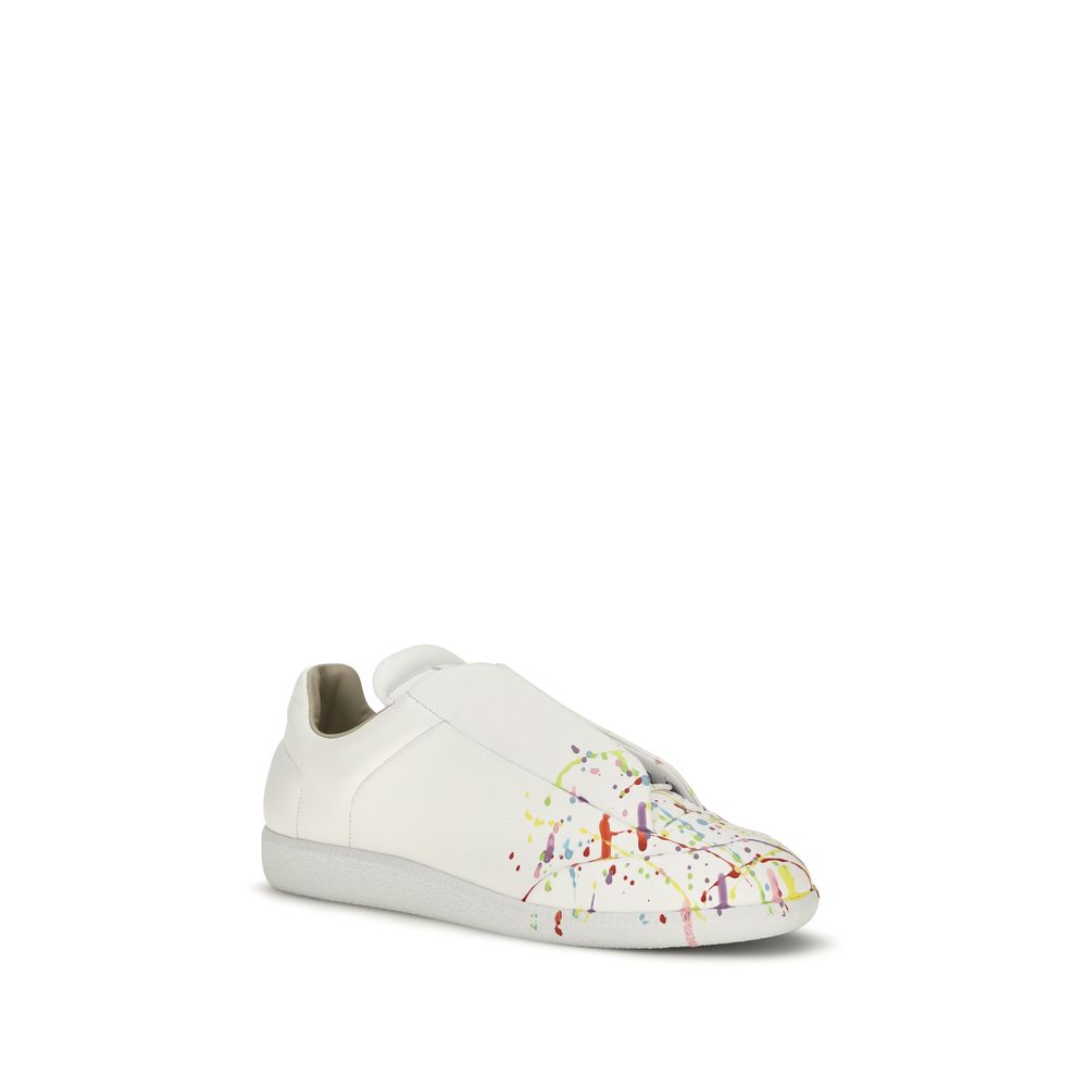 Sneakers by Maison Margiela for men in bos taurus calf patent leather white features an fashionable silhouette, showcasing the premium Men's Low Top Slip On Bos Taurus Calf Patent Leather Sneakers in a fashionable low-top slip-on style that offers a fashionable finish for refined style.