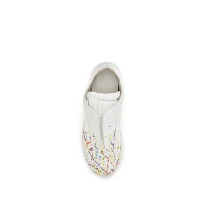 Sneakers by Maison Margiela for men in bos taurus calf patent leather white presents a impeccable silhouette as Men's Low Top Slip On Bos Taurus Calf Patent Leather Sneakers, expertly defined by a impeccable low-top slip-on style for a impeccable, high-fashion look.