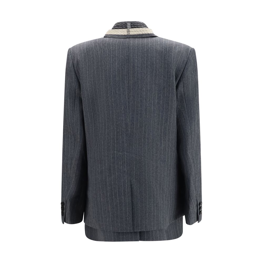 Vest by Sacai for women in wool gray & pinstripe features an on trend silhouette, showcasing a sophisticated single-breasted neckline and premium pockets for a truly on trend finish.