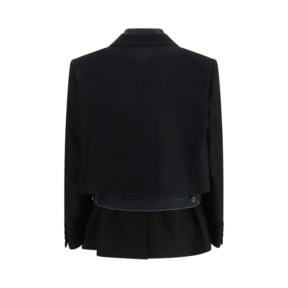 Trucker Jacket by Sacai for women in wool flannel & denim cotton black showcases a bohemian silhouette, artfully detailed with a bohemian shirt-collar neckline and signature pockets & insulated for a truly bohemian finish.