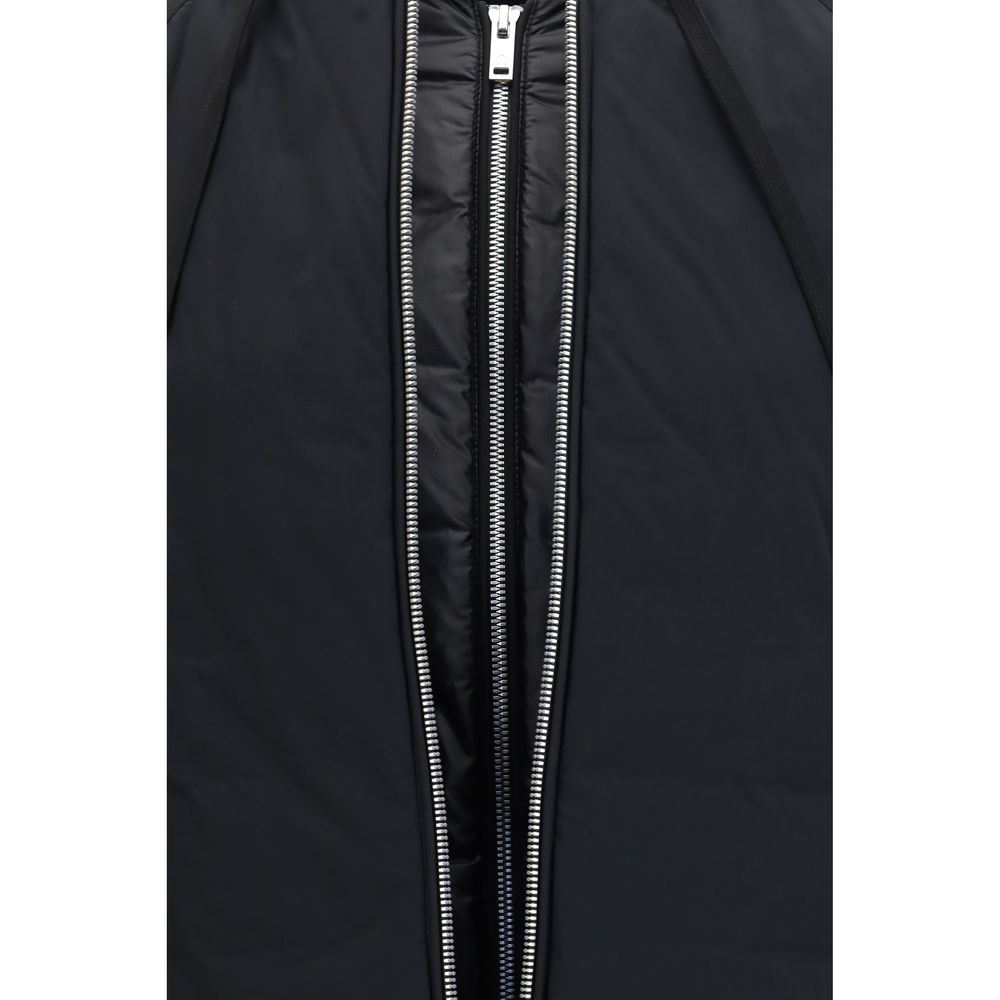 Hooded Bomber Jacket by Moose Knuckles for women in nylon & duck-down black features a dramatic silhouette, showcasing a sophisticated hooded neckline and distinctive breathable-design, pockets, hooded & insulated for a dramatic aesthetic.