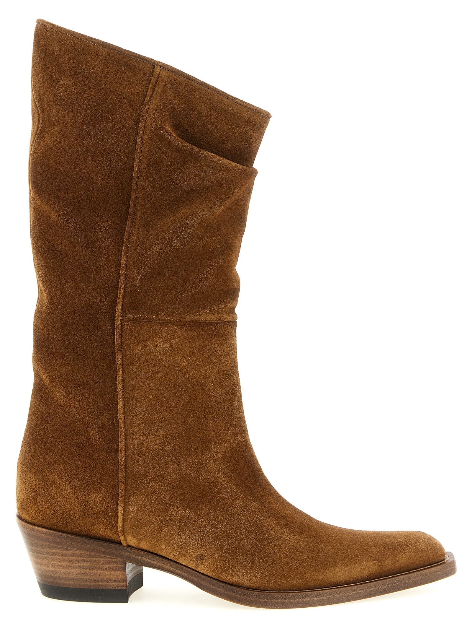 Chelsea Cowboy Mid-Calf Boots by Khaite for women in calfskin suede leather brown features an avant-garde Women's Calfskin Suede Leather Chelsea Cowboy Mid-Calf Boots silhouette, defined by a sophisticated block-heel and a avant-garde .