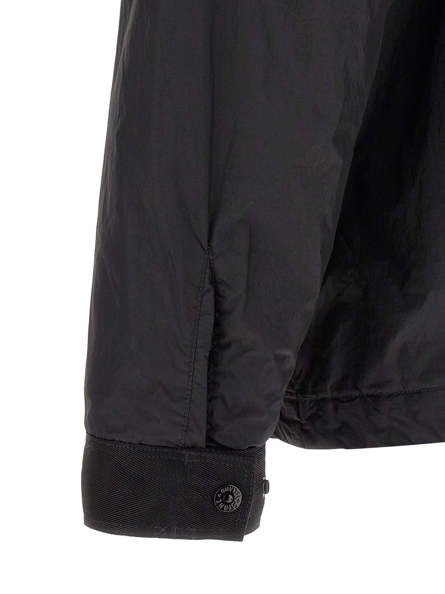 Windbreaker Jacket by Stone Island for men in nylon & resin black & signature showcases a urban chic silhouette, detailed with a urban chic shirt-collar neckline and functional lightweight & windproof for a polished finish.
