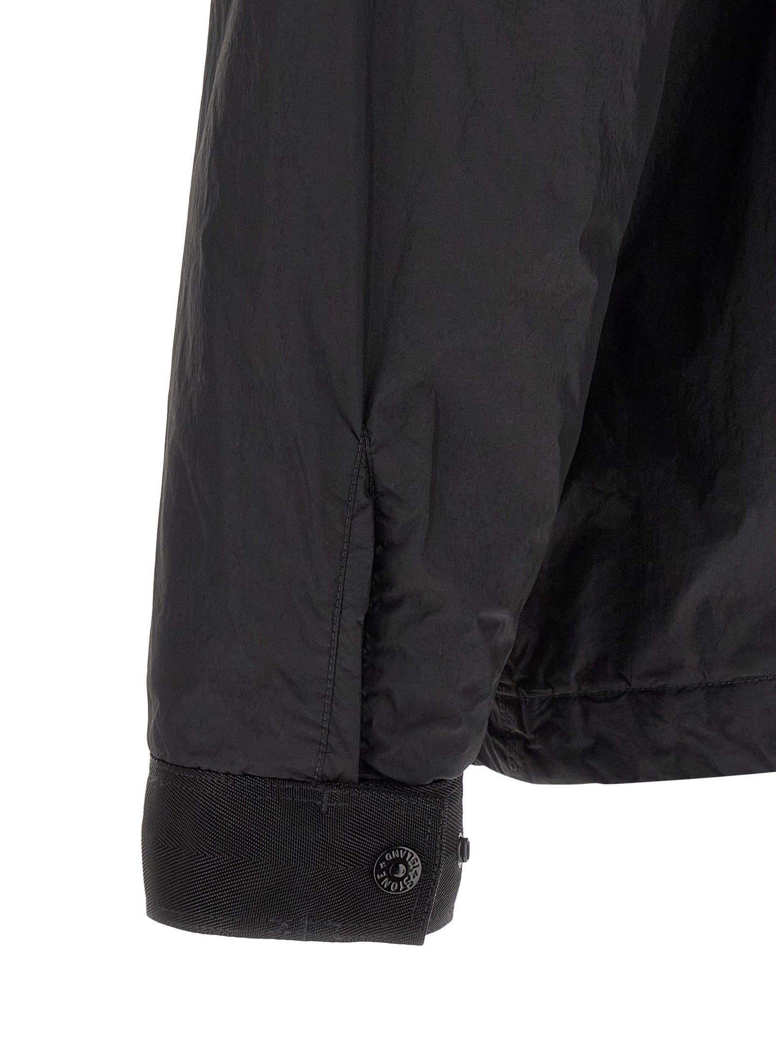 Windbreaker Jacket by Stone Island for men in nylon & resin black & signature showcases a urban chic silhouette, detailed with a urban chic shirt-collar neckline and functional lightweight & windproof for a polished finish.