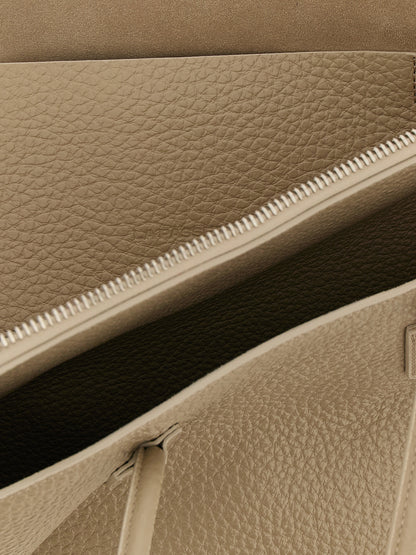 Medium Shoulder Bag by The Attico for women in bos taurus suede calf leather beige & sand features a effortless sophistication silhouette, secured by a zipper with ample and versatile shoulder-strap & handle for a effortless sophistication finish.