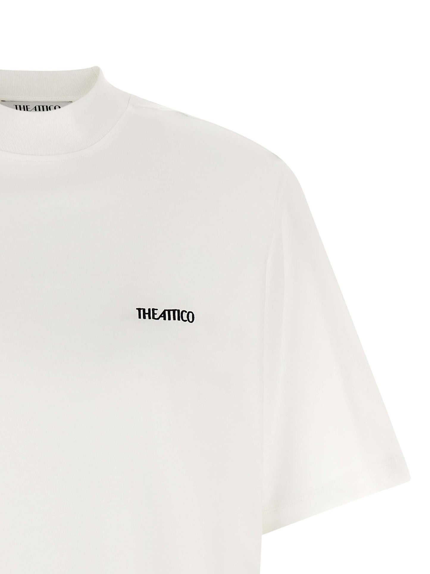 T-Shirt by The Attico for women in cotton white features an edgy silhouette, meticulously detailed with a sophisticated and mock neckline for a truly edgy finish.
