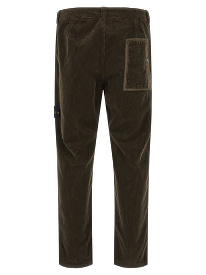 Casual Pants by Stone Island for men in organic cotton corduroy canvas charcoal & gray presents a refined pantology silhouette, artfully defined by a refined pantology , long, and a sophisticated .