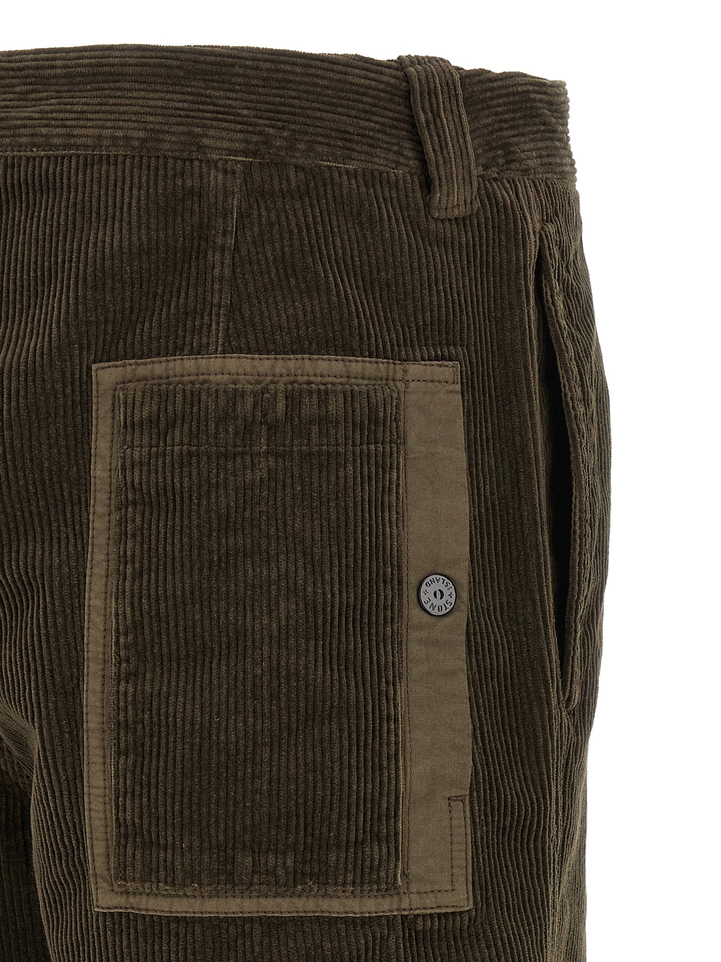 Casual Pants by Stone Island for men in organic cotton corduroy canvas charcoal & gray presents a tailored silhouette, showcasing a tailored and long cut with a refined for a truly tailored aesthetic.