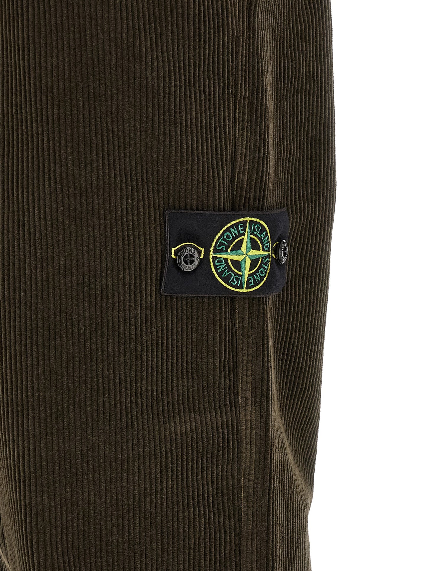 Casual Pants by Stone Island for men in organic cotton corduroy canvas charcoal & gray features a refined silhouette with a refined , defined by a and a refined long for a refined finish.