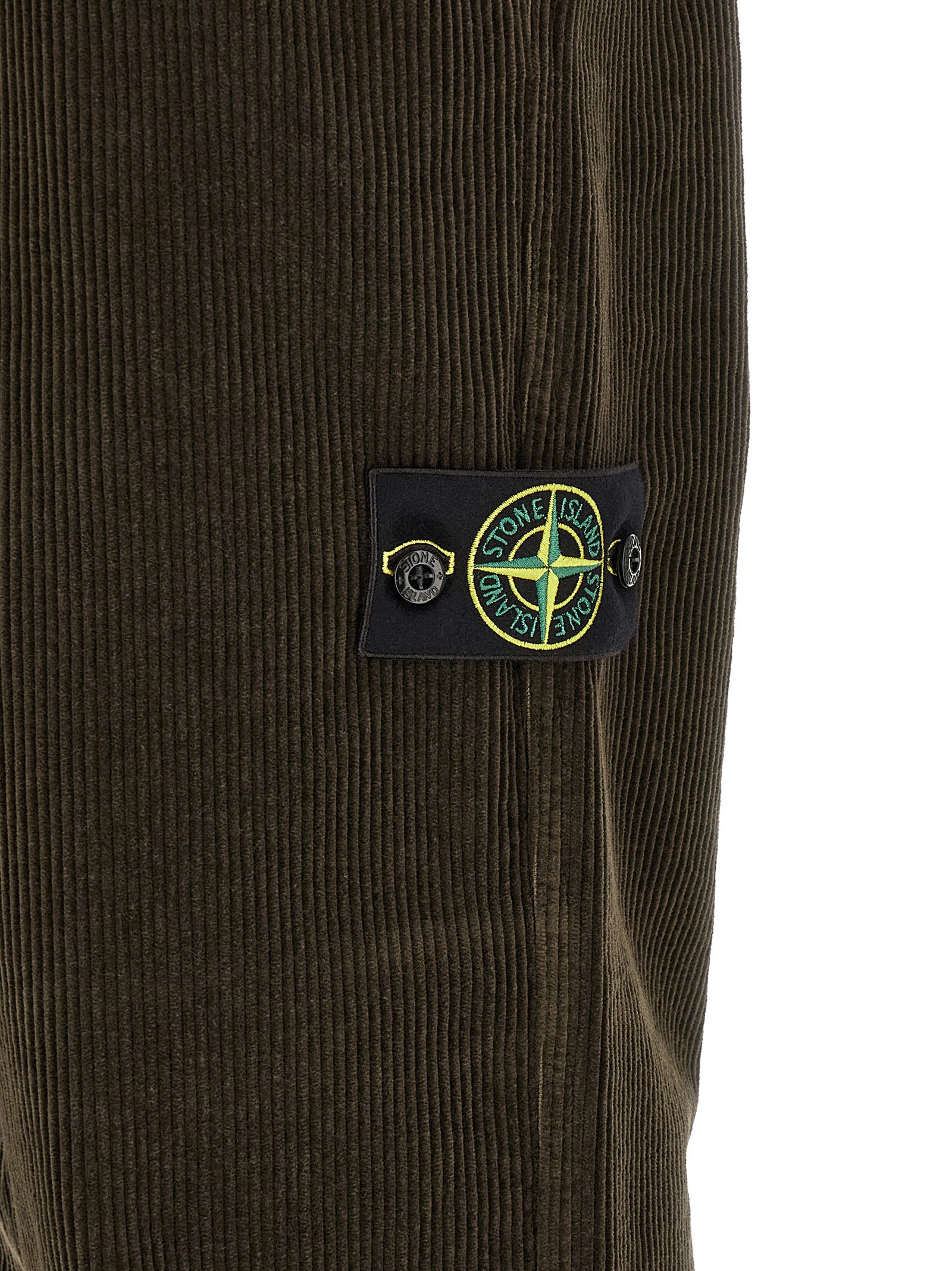Casual Pants by Stone Island for men in organic cotton corduroy canvas charcoal & gray features a refined silhouette with a refined , defined by a and a refined long for a refined finish.