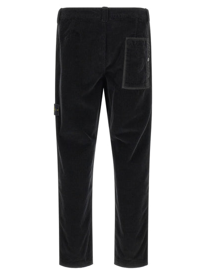 Trousers by Stone Island for men in organic cotton corduroy black features an on trend silhouette, showcasing a sophisticated with a long and for an on trend finish.