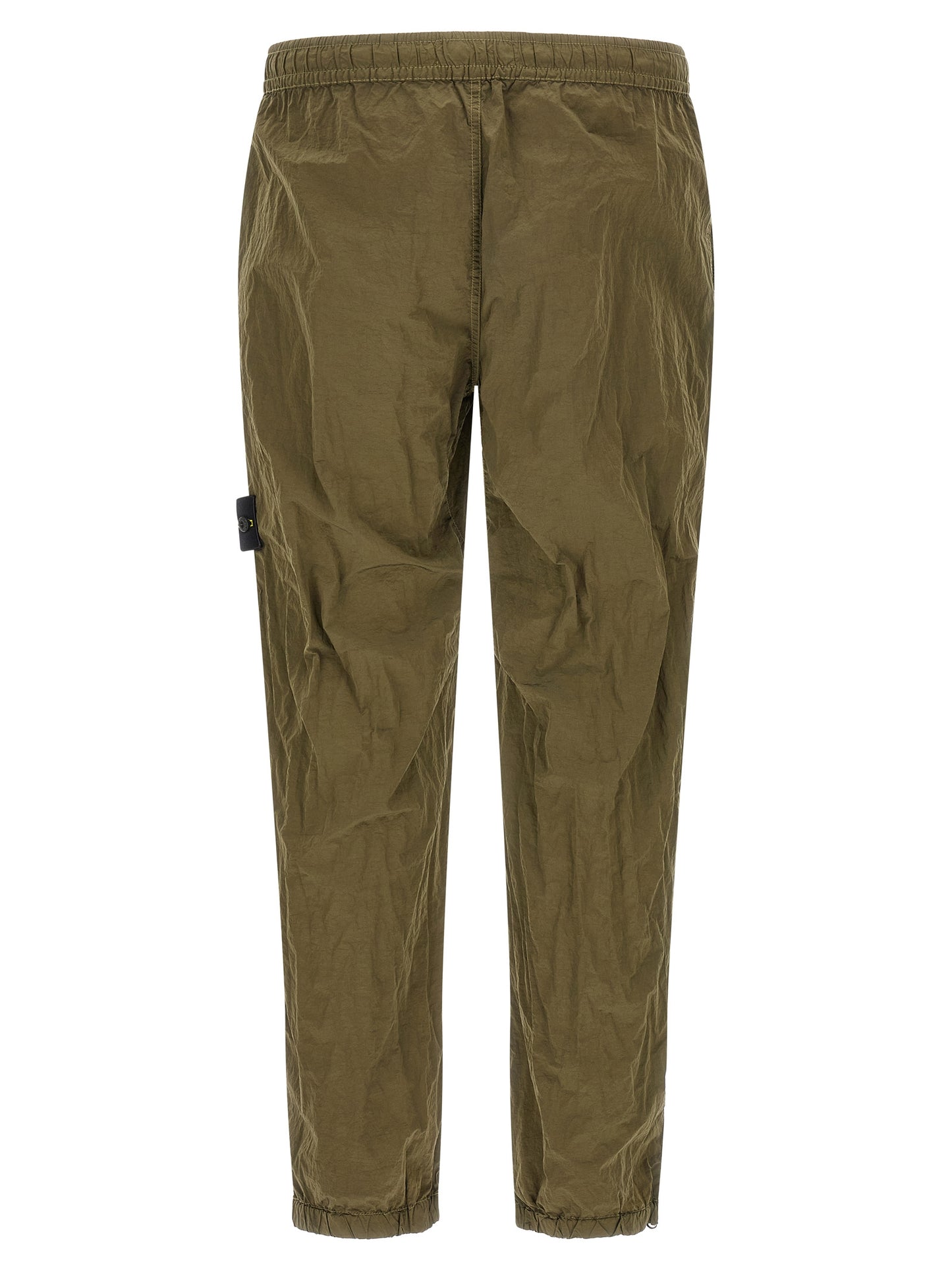 Joggers by Stone Island for men in nylon bicolour, green & olive presents a refined pantology silhouette, artfully defined by a refined pantology athletic, long, and a sophisticated .