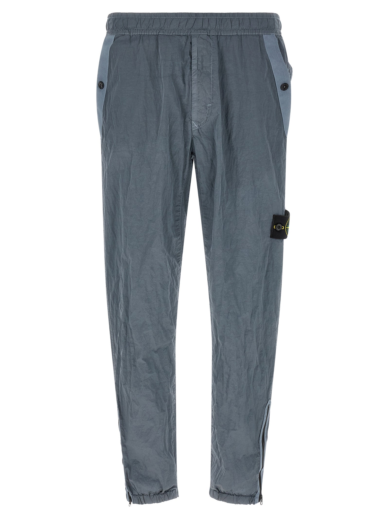 Joggers by Stone Island for men in nylon gray features an sartorial and long with a cut for a sartorial finish.