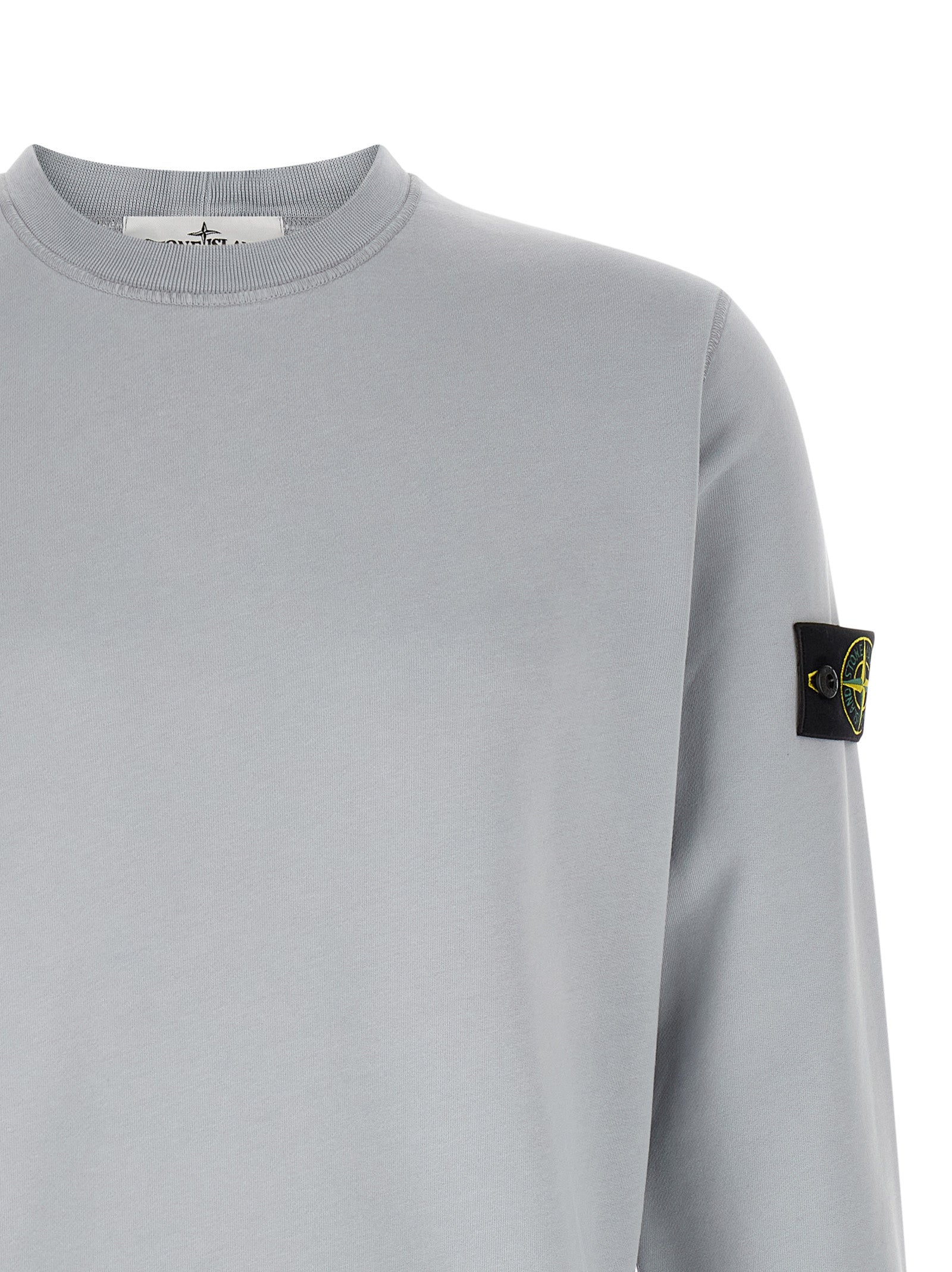 Sweatshirt by Stone Island for men in organic cotton gray presents a smart casual silhouette, featuring a smart casual crew neckline and for a sophisticated look.