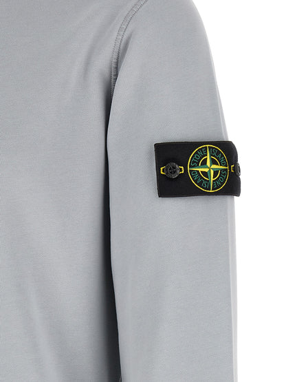 Sweatshirt by Stone Island for men in organic cotton gray features an magnificent silhouette, showcasing a sophisticated and detail for a truly magnificent finish.