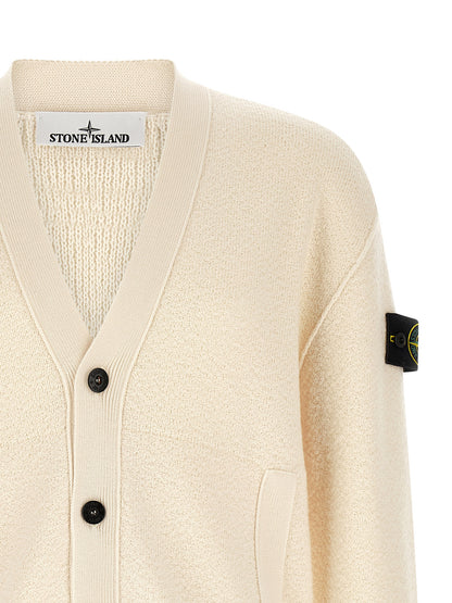Cardigan by Stone Island for men in virgin wool white showcases a luxurious silhouette, meticulously detailed with a sophisticated v-neck neckline and for a refined finish.