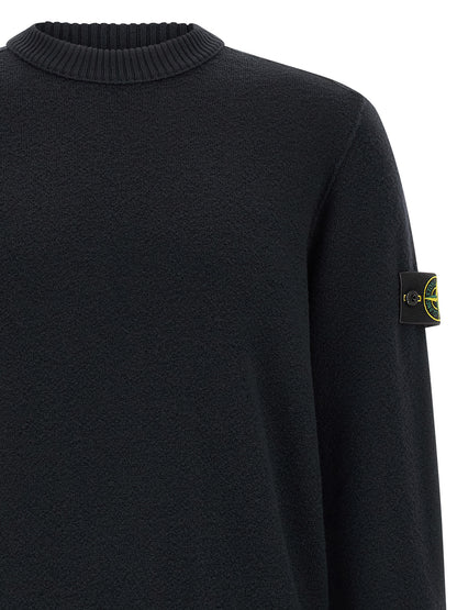 Cardigan by Stone Island for men in virgin wool blue features an impeccable silhouette, showcasing a sophisticated crew neckline and detail for a truly impeccable finish.