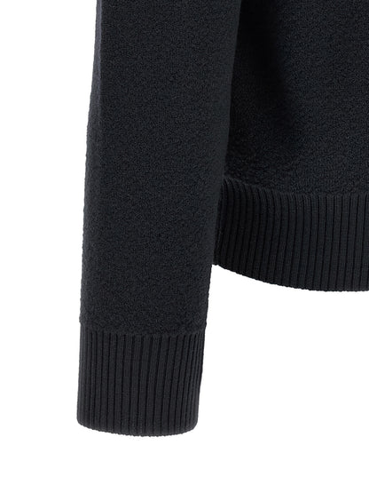 Cardigan by Stone Island for men in virgin wool blue features a nuanced silhouette with a refined crew neckline and nuanced detailing for a sophisticated look.