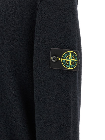 Cardigan by Stone Island for men in virgin wool blue features a nuanced silhouette with a refined and nuanced detailing for a sophisticated look.