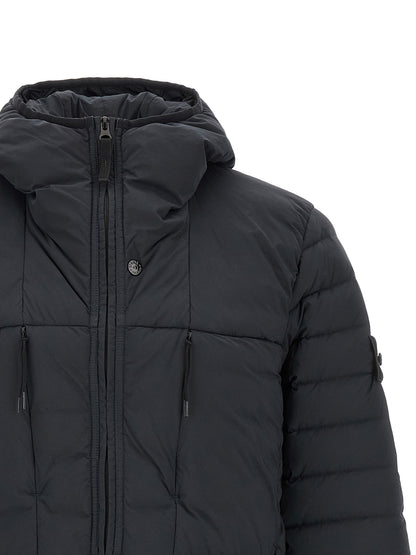 Hooded Puffer Jacket by Stone Island for men in stretch polyamide blue presents a effortlessly chic silhouette, showcasing a sophisticated hooded high-neck neckline and premium hooded & insulated for a truly effortlessly chic finish.