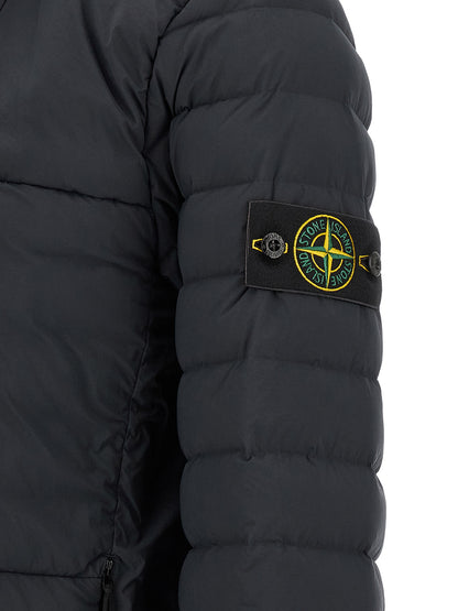 Hooded Puffer Jacket by Stone Island for men in stretch polyamide blue showcases a bohemian silhouette, artfully detailed with a bohemian and signature hooded & insulated for a truly bohemian finish.